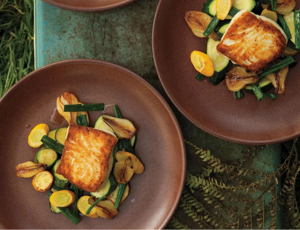 alaskan halibut with spring onions and summer squash