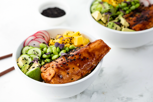 Alaskan sockeye salmon bowl with glazed fillet, avocado, edamame, cucumber, radish and mango cubes