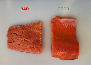 Left fillet labeled BAD is dull, mushy and discolored; right fillet labeled GOOD is firm and bright orange
