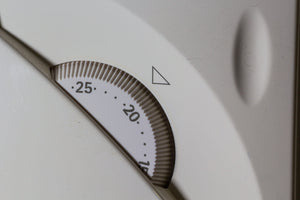 temperature control dial showing numbers 25 and 20