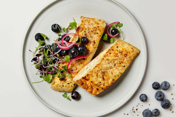 grilled halibut on a white plate