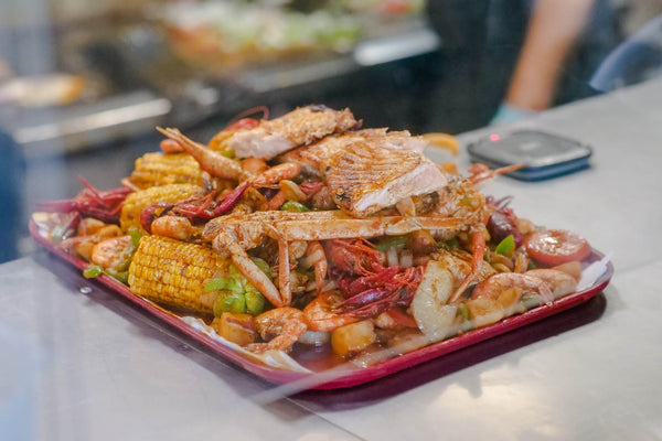 seafood boil in a red tray